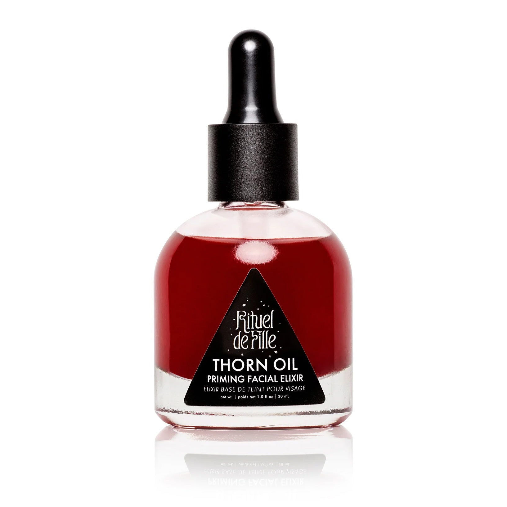 Thorn Oil Priming Facial Elixir bottle with black cap on a white background